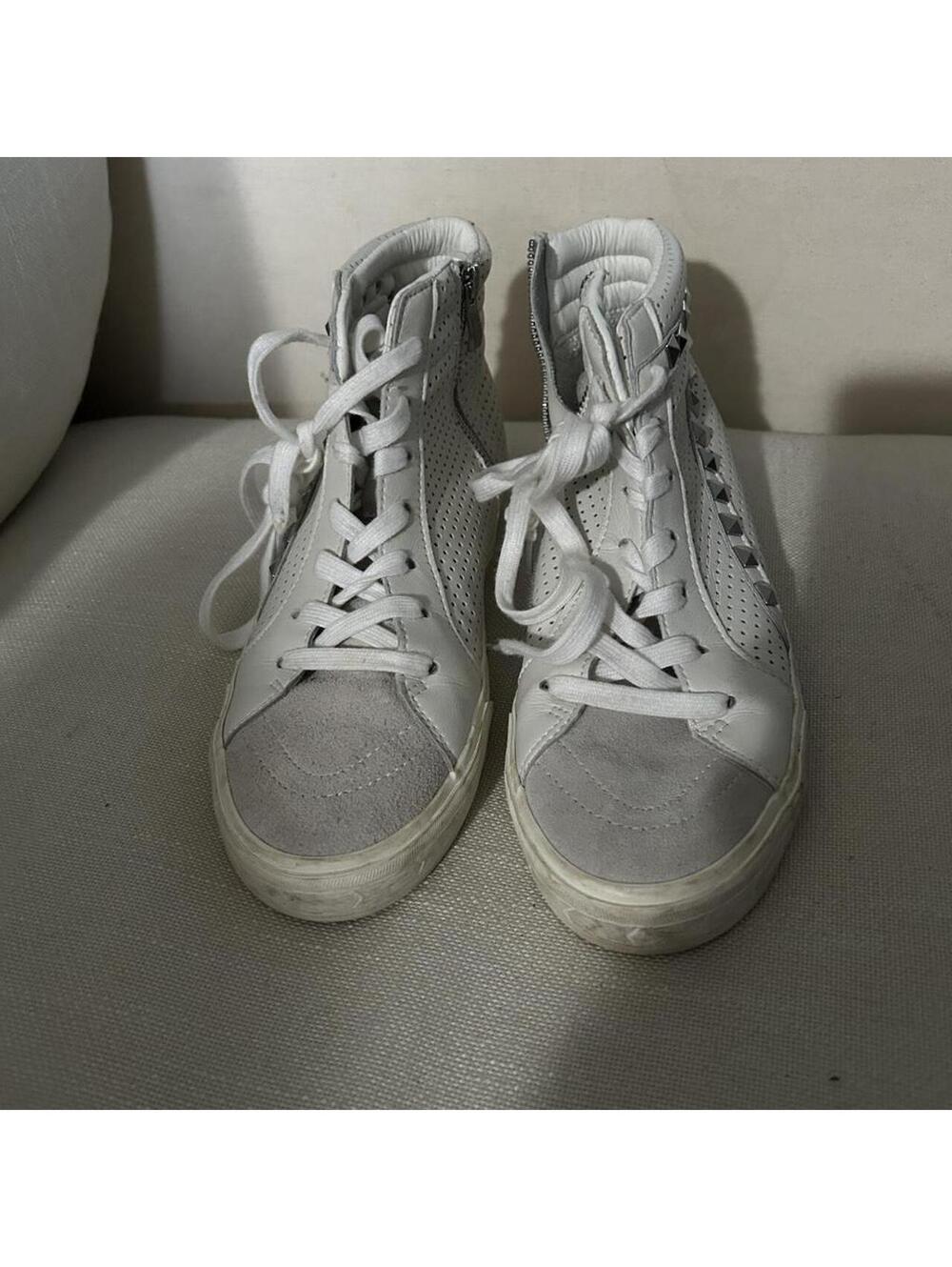 Steve Madden white high top sneakers with perforated detailing and silver studs